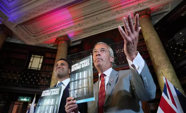Nigel Farage, Leader of Britain's Reform UK party, right, and Zia Yusuf, Reform UK's spokesperson for home affairs attend a press conference in London, Monday, Aug. 10, 2026. (AP Photo/Kin Cheung)