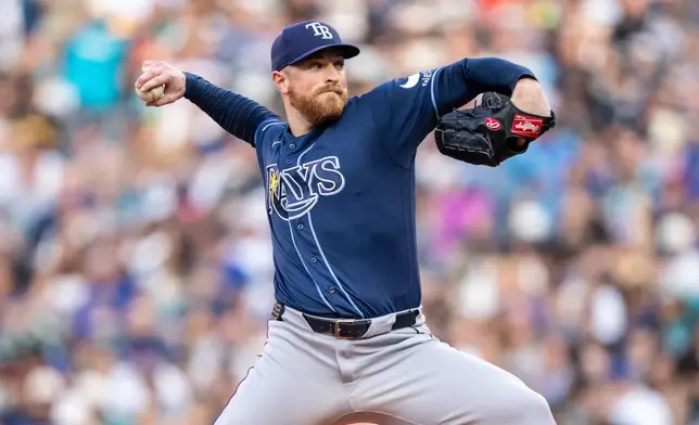 Tampa Bay Rays starting pitcher Drew Rasmussen delivers a pitch during the second inning of a baseball game against the Seattle Mariners, Friday, Aug. 7, 2026, in Seattle. (AP Photo/Stephen Brashear)