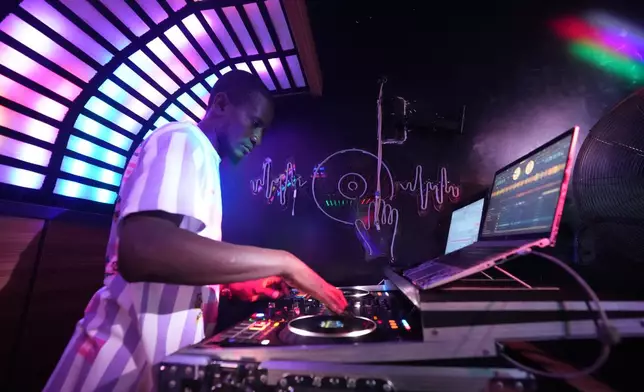 A DJ plays music inside a nightclub in Sokoto, Nigeria, July 18, 2026. (AP Photo/Sunday Alamba)