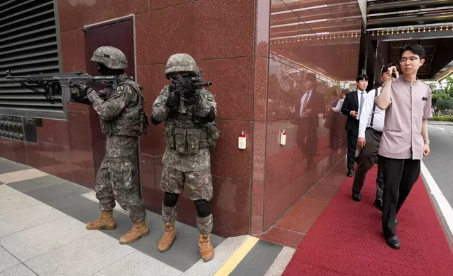 South Korea army soldiers take part in an anti-terror drill as a part of the Ulchi Freedom Shield military exercise between the U.S. and South Korea in Seoul, South Korea, Wednesday, Aug. 19, 2026. (AP Photo/Ahn Young-joon)