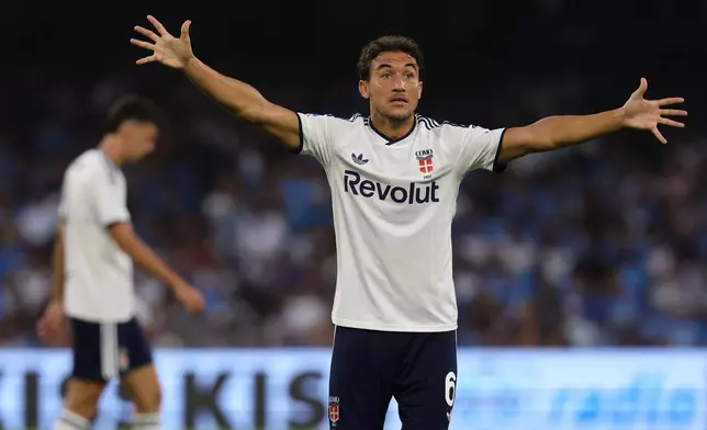 Como's Luis Milla reacts during the Serie A soccer match between Napoli and Como, in Naples, Italy, Sunday, Aug. 30, 2026. 2026. (Alessandro Garofalo/LaPresse via AP)