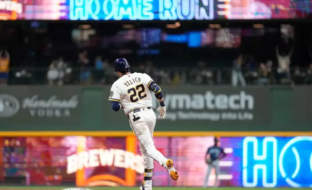 Milwaukee Brewers' Christian Yelich rounds the bases after hitting a three-run home run during the fifth inning of a baseball game against the Seattle Mariners, Tuesday, Aug. 18, 2026, in Milwaukee. (AP Photo/Aaron Gash)