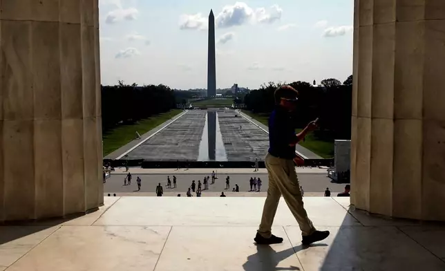 The Washington Monument is seen in the background of the now drained Lincoln Memorial Reflecting Pool, Wednesday, July 29, 2026, in Washington. (AP Photo/Rahmat Gul)
