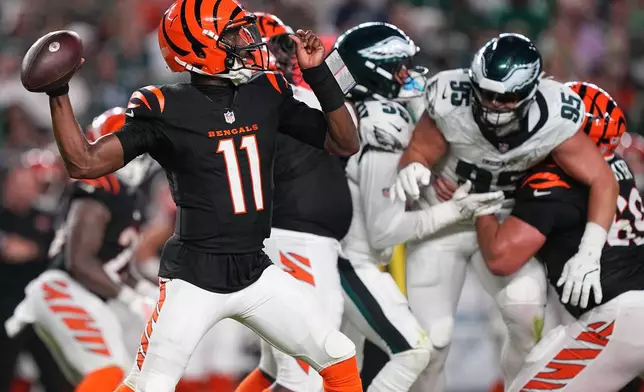 Cincinnati Bengals quarterback Josh Johnson (11) looks to pass during the first half of a preseason NFL football game against the Philadelphia Eagles on Friday, Aug. 28, 2026, in Philadelphia. (AP Photo/Matt Rourke)