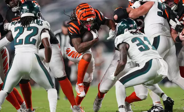 Cincinnati Bengals' Kendall Milton runs the ball during the first half of a preseason NFL football game against the Philadelphia Eagles on Friday, Aug. 28, 2026, in Philadelphia. (AP Photo/Matt Rourke)