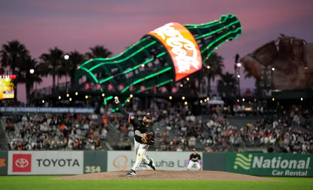 San Francisco Giants pitcher Anthony Molina throws against the Cincinnati Reds during the fifth inning of a baseball game Tuesday, Aug. 25, 2026, in San Francisco. (AP Photo/Tony Avelar)