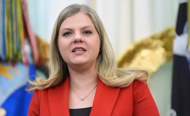 FILE - Heidi Overton, deputy director of the White House Domestic Policy Council, speaks during a meeting to sign an executive order about vaccines, Monday, Aug. 10, 2026, in the Oval Office of the White House in Washington. (AP Photo/Jacquelyn Martin, File)