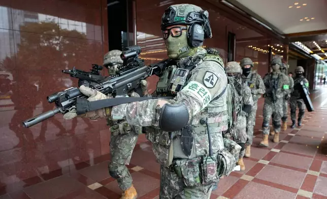 South Korea army soldiers take part in an anti-terror drill as a part of the Ulchi Freedom Shield military exercise between the U.S. and South Korea in Seoul, South Korea, Wednesday, Aug. 19, 2026. (AP Photo/Ahn Young-joon)