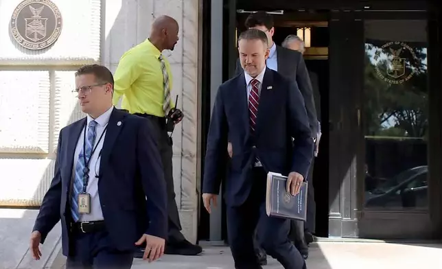 United States Trade Representative Jamieson Greer, center, leaves the U.S. Department of Commerce following a meeting with Canadian officials, in Washington, Monday, Aug. 17, 2026. (Kelly Geraldine Malone/The Canadian Press via AP)
