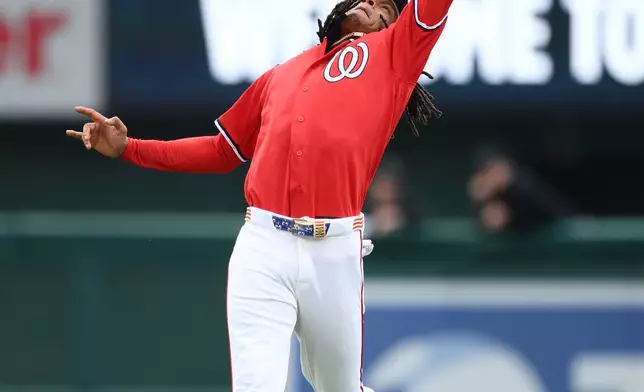 Washington Nationals second baseman CJ Abrams leaps up to catch a line drive hit by Miami Marlins' Esteury Ruiz for an out during the sixth inning of a baseball game, Sunday, Aug. 30, 2026, in Washington. (AP Photo/Nick Wass)