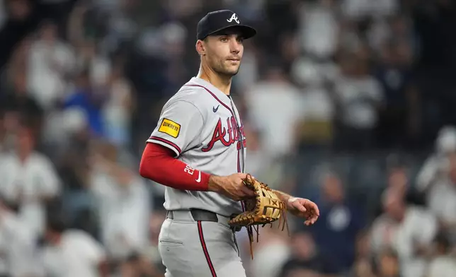 Atlanta Braves' Matt Olson leaves the field after a baseball game against the New York Yankees Saturday, Aug. 8, 2026, in New York. (AP Photo/Frank Franklin II)