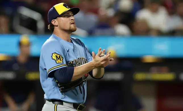 Milwaukee Brewers pitcher Chad Patrick reacts during the sixth inning of a baseball game against the New York Mets on Tuesday, Aug. 25, 2026, in New York. (AP Photo/Adam Hunger)