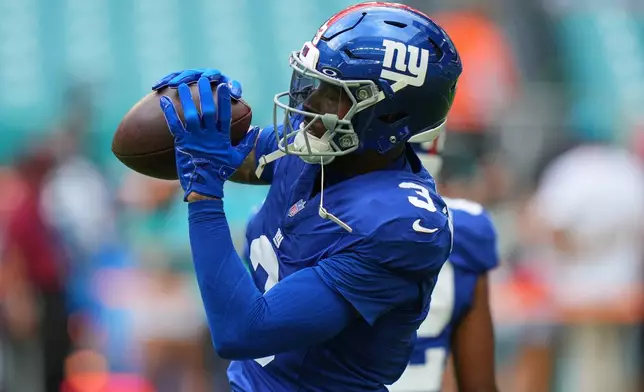 New York Giants wide receiver Odell Beckham Jr. (3) warms up on the field before a preseason NFL football game against the Miami Dolphins, Saturday, Aug. 22, 2026, in Miami Gardens, Fla. (AP Photo/Lynne Sladky)