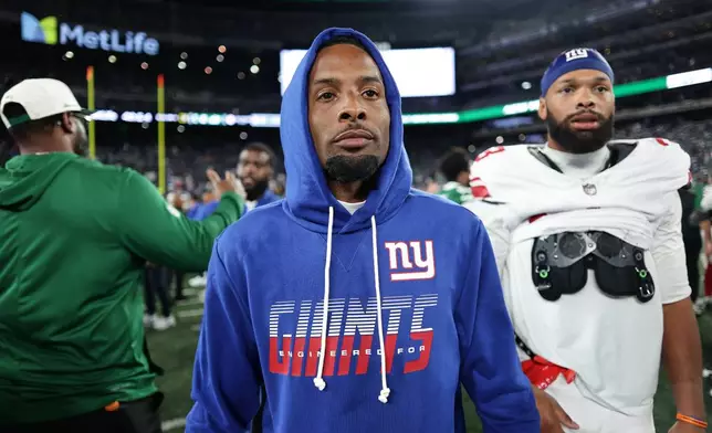 New York Giants wide receiver Odell Beckham Jr. (3) walk on the field after a preseason NFL football game against the New York Jets, Friday, Aug. 28, 2026, in East Rutherford, N.J. (AP Photo/Adam Hunger)