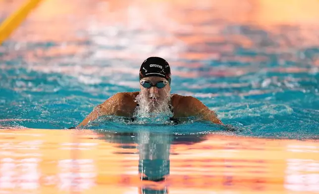 Kate Douglass, of the United States, competes in the women's 100 meters breaststroke final at the Pan Pacific Swimming Championships Thursday, Aug. 13, 2026 in Irvine, Calif. (AP Photo/Gregory Bull)
