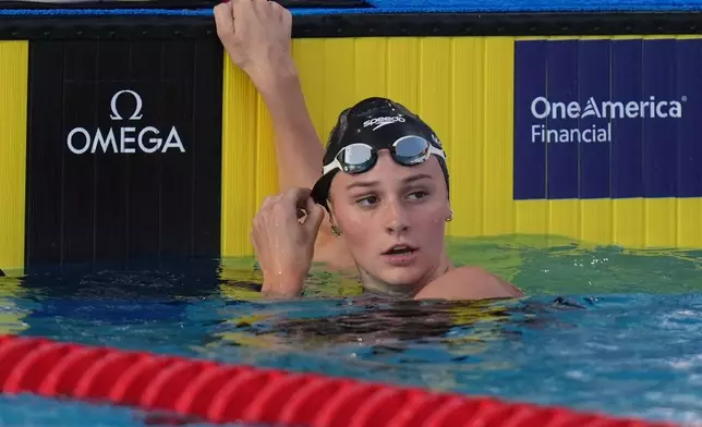 Summer McIntosh, of Canada, looks on after the women's 400 meters freestlye final at the Pan Pacific Swimming Championships Friday, Aug. 14, 2026 in Irvine, Calif. (AP Photo/Gregory Bull)