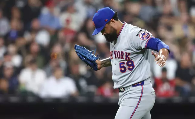 New York Mets pitcher Sean Manaea reacts during the fourth inning of a baseball game against the Chicago White Sox in Chicago, Friday, Aug. 21, 2026. (AP Photo/Jessie Alcheh)
