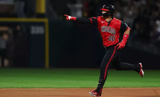 Chicago White Sox's Miguel Vargas gestures after hitting a home run during the sixth inning of a baseball game against the New York Mets in Chicago, Friday, Aug. 21, 2026. (AP Photo/Jessie Alcheh)