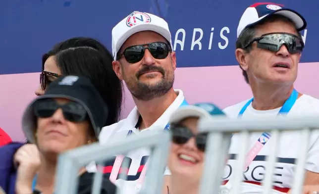 FILE - Norway's Crown Prince Haakon, center, watches canoe sprint competitions at the 2024 Summer Olympics, Thursday, Aug. 8, 2024, in Vaires-sur-Marne, France. (AP Photo/Lindsey Wasson, File)