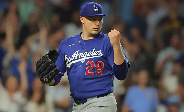 Los Angeles Dodgers' Tarik Skubal reacts after a play at home plate during the sixth inning of a baseball game against the Chicago Cubs, Tuesday, Aug. 4, 2026, in Chicago. (AP Photo/Melissa Tamez)