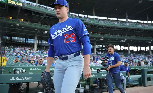 Los Angeles Dodgers starting pitcher Tarik Skubal makes his way to the bullpen prior to a baseball game against the Chicago Cubs, Tuesday, Aug. 4, 2026, in Chicago. (AP Photo/Melissa Tamez)