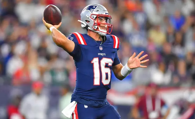 New England Patriots quarterback Tommy DeVito (16) throws against the Philadelphia Eagles during the first half of an NFL preseason football game, Saturday, Aug. 22, 2026, in Foxborough, Mass. (AP Photo/Steven Senne)