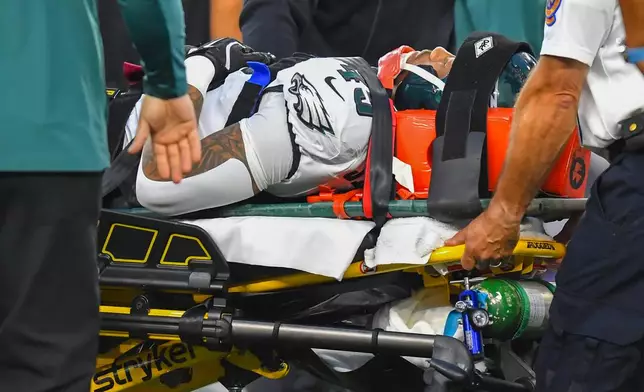 Philadelphia Eagles' Ja'Quinden Jackson is taken off the field on a stretcher after an injury against the New England Patriots during the first half of an NFL preseason football game, Saturday, Aug. 22, 2026, in Foxborough, Mass. (AP Photo/Steven Senne)