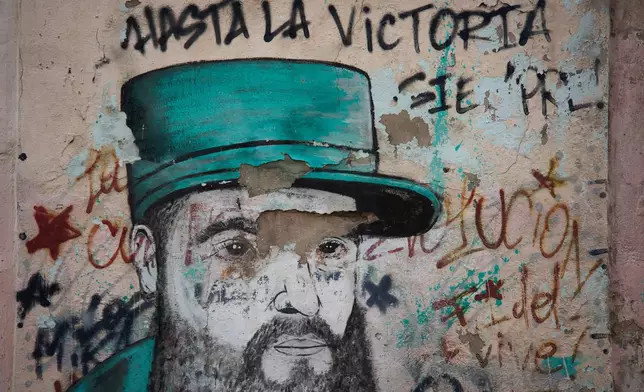 A weathered mural of Fidel Castro covers a wall in Havana, Cuba, Wednesday, Aug. 12, 2026. (AP Photo/Ramon Espinosa)