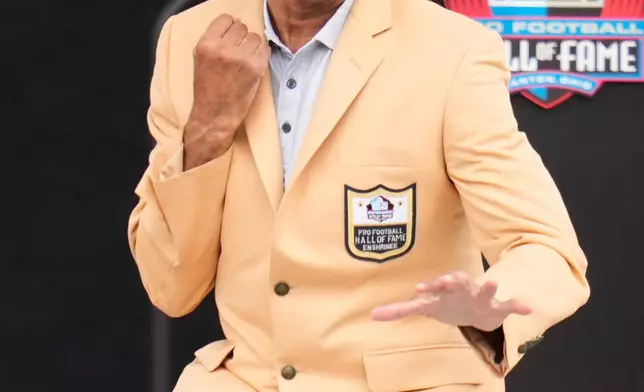 Former NFL player Roger Craig is introduced during the Pro Football Hall of Fame induction ceremony at the Pro Football Hall of Fame, in Canton, Ohio, Saturday, Aug. 8, 2026. (AP Photo/Sue Ogrocki)