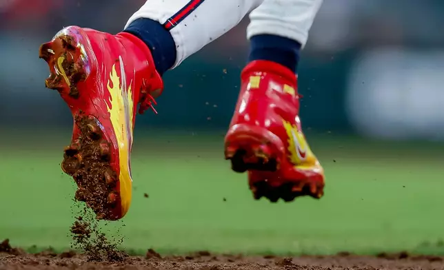 Atlanta Braves' Ronald Acuña Jr. takes off from first base to score against the Colorado Rockies on a double hit by Michael Harris II during the second inning of a baseball game, Friday, Aug. 28, 2026, in Atlanta. (AP Photo/Erik S. Lesser)