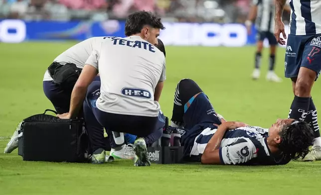 Monterrey defender Carlos Salcedo lies on the field during the first half of a Leagues Cup soccer match against Inter Miami, Saturday, Aug. 8, 2026, in Miami. (AP Photo/Lynne Sladky)