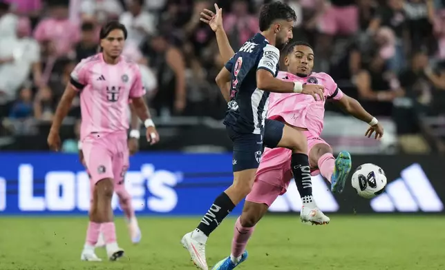 Inter Miami midfielder Yannick Bright, right, kicks the ball against Monterrey midfielder Diego Rossi (9) 19during the second half of a Leagues Cup soccer match, Saturday, Aug. 8, 2026, in Miami. (AP Photo/Lynne Sladky)