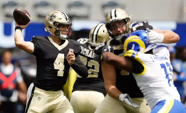 New Orleans Saints quarterback Zach Wilson throws a pass during the first half an NFL preseason football game against the Los Angeles Rams Saturday, Aug. 22, 2026, in Inglewood, Calif. (AP Photo/Caroline Brehman)