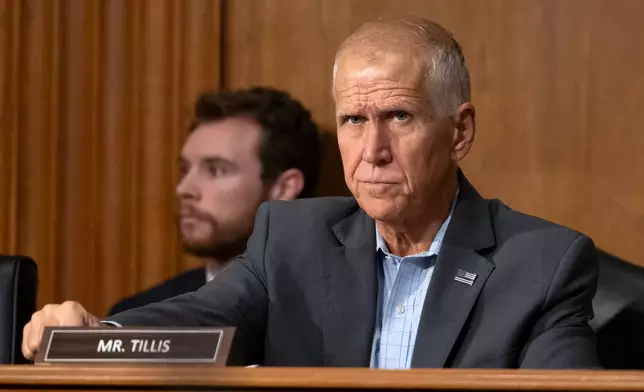 Sen. Thom Tillis, R-N.C., arrives for a hearing of the Senate Finance Committee on Capitol Hill, Thursday, July 30, 2026, in Washington. (AP Photo/Mark Schiefelbein)