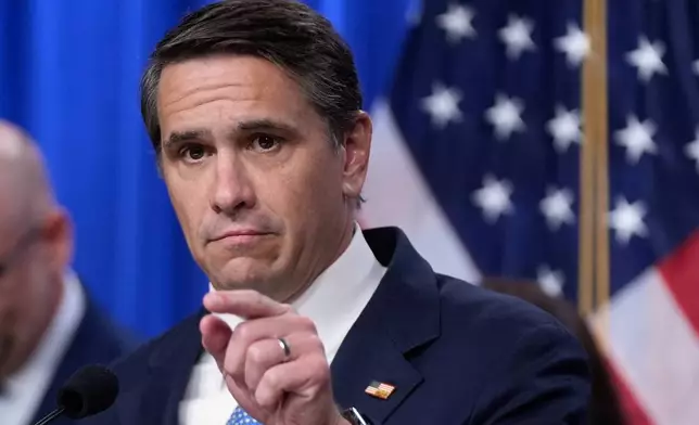 FILE - Acting Attorney General Todd Blanche speaks during a news conference on unaccompanied children at the Justice Department, June 11, 2026, in Washington. (AP Photo/Manuel Balce Ceneta, File)