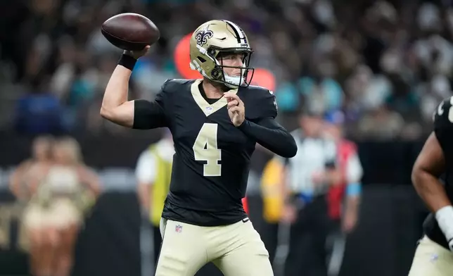 New Orleans Saints quarterback Zach Wilson throws during the first half of an NFL preseason football game against the Jacksonville Jaguars Saturday, Aug. 15, 2026, in New Orleans. (AP Photo/Gerald Herbert)