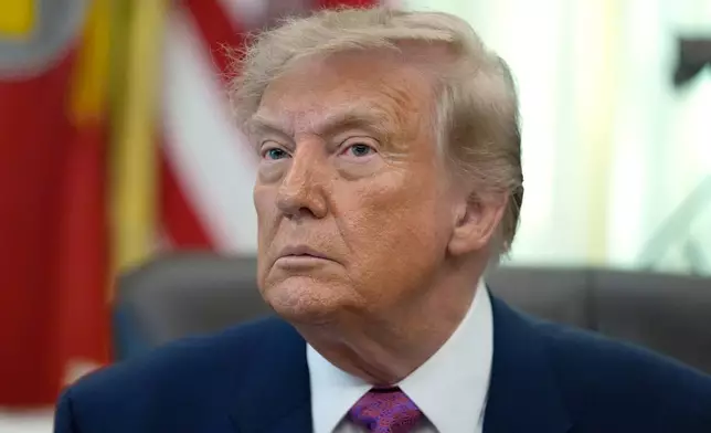 President Donald Trump listens to a question from a reporter in the Oval Office of the White House, Thursday, Aug. 27, 2026, in Washington. (AP Photo/Manuel Balce Ceneta)