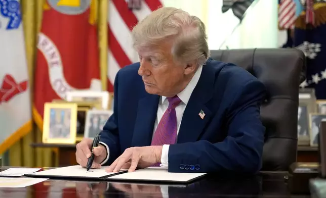 President Donald Trump signs an executive order in the Oval Office of the White House, Thursday, Aug. 27, 2026, in Washington. (AP Photo/Manuel Balce Ceneta)