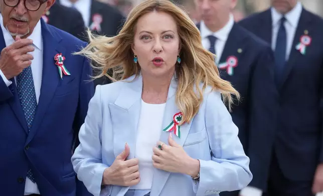 FILE - Italian Premier Giorgia Meloni arrives to attend the parade on the occasion of the 80th anniversary of the proclamation of the Italian Republic, in Rome, Tuesday, June 2, 2026. (AP Photo/Andrew Medichini, File)