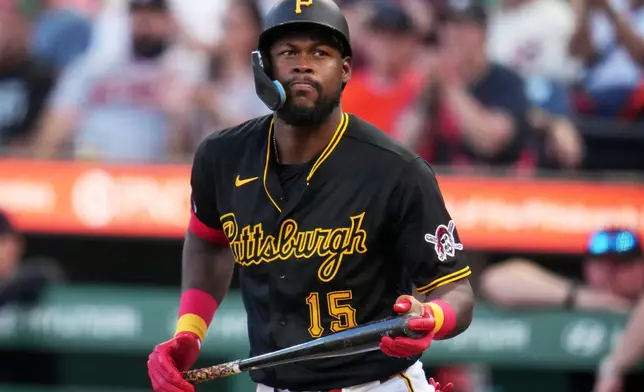 Pittsburgh Pirates' Oneil Cruz heads back to the dugout after striking out against Detroit Tigers pitcher Keider Montero during the second inning of a baseball game in Pittsburgh, Tuesday, Aug. 18, 2026. (AP Photo/Gene J. Puskar)