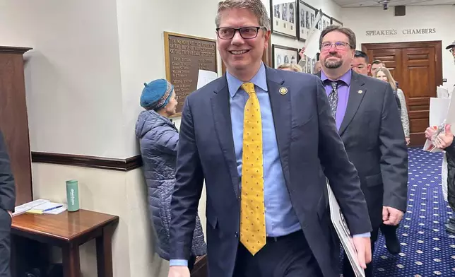 FILE - Alaska Republican U.S. Rep. Nick Begich walks down a corridor in the state Capitol before giving a speech to Alaska lawmakers, March 10, 2026, in Juneau, Alaska. (AP Photo/Becky Bohrer, File)