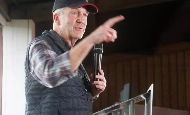 U.S. Sen. Dan Sullivan, R-Alaska, speaks at a get out the vote event held at farm in Palmer, Alaska, on Monday, Aug. 17, 2026. (AP Photo/Mark Thiessen)