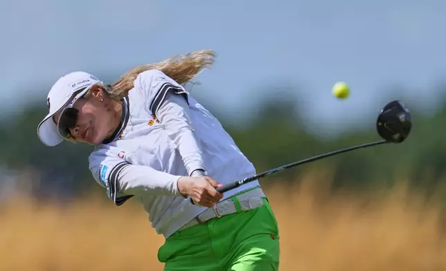Shiho Kuwaki, of Japan, drives off the 3rd tee during the third round of the Women's British Open golf championship in Lytham St Annes, England, Saturday, Aug. 1, 2026. (AP Photo/Jon Super)