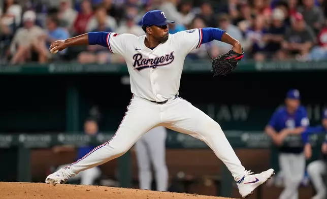 Texas Rangers pitcher Kumar Rocker throws to the Washington Nationals in the fourth inning of a baseball game Wednesday, Aug. 19, 2026, in Arlington, Texas. (AP Photo/Tony Gutierrez)