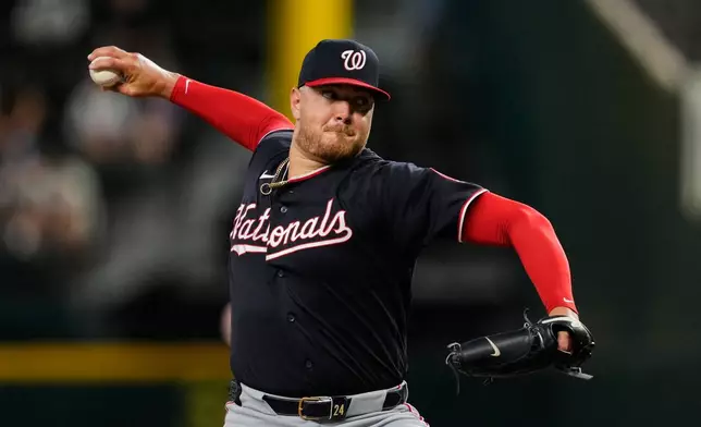Washington Nationals pitcher Cade Cavalli throws to the Texas Rangers in the first inning of a baseball game Wednesday, Aug. 19, 2026, in Arlington, Texas. (AP Photo/Tony Gutierrez)
