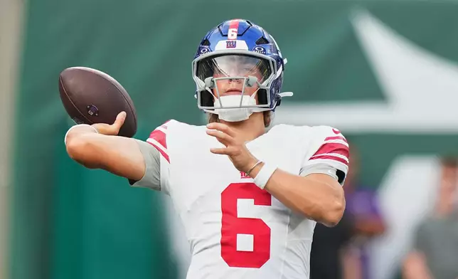New York Giants quarterback Jaxson Dart (6) warms up on the field before a preseason NFL football game against the New York Jets, Friday, Aug. 28, 2026, in East Rutherford, N.J. (AP Photo/Frank Franklin II)