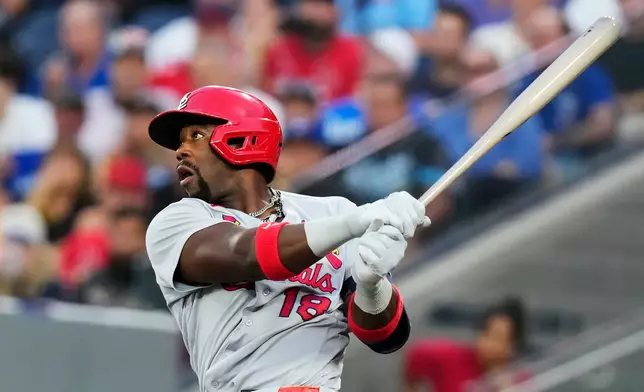 St. Louis Cardinals' Jordan Walker watches his RBI single against the Toronto Blue Jays during the fifth inning of a baseball game in Toronto, Friday, July 31, 2026. (Chris Young/The Canadian Press via AP)