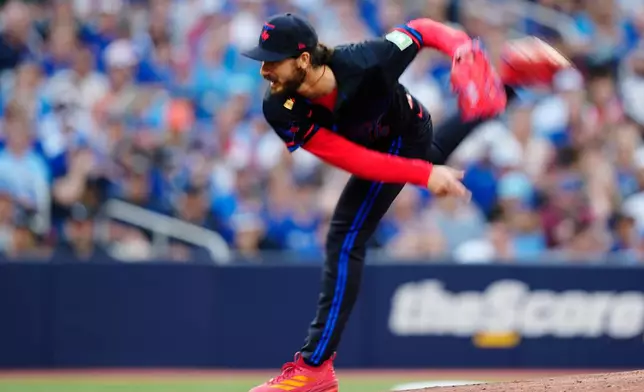 Toronto Blue Jays pitcher Dylan Cease (84) works against the St. Louis Cardinals during the first inning of a baseball game against the St. Louis Cardinals in Toronto, Friday, July 31, 2026. (Chris Young/The Canadian Press via AP)