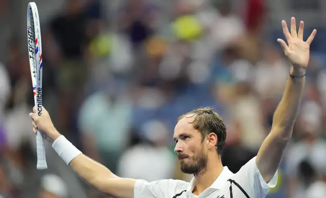 Daniil Medvedev, of Russia, celebrates after he defeated Hugo Gaston, of France, during the first round of the U.S. Open tennis championships Sunday, Aug. 30, 2026, in New York. (AP Photo/Kirsty Wigglesworth)
