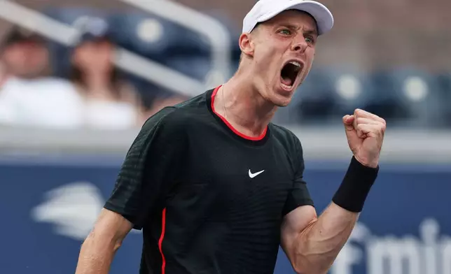Denis Shapovalov, of Canada, reacts during a match against Miomir Kecmanovic, of Serbia, during the first round of the U.S. Open tennis championships, Sunday, Aug. 30, 2026, in New York. (AP Photo/Adam Hunger)